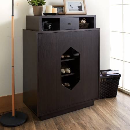 Toppa in pelle color caffè scuro.